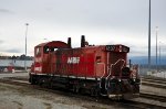 Roster shot of NREX 1237, idling on a side track in Brownsville.